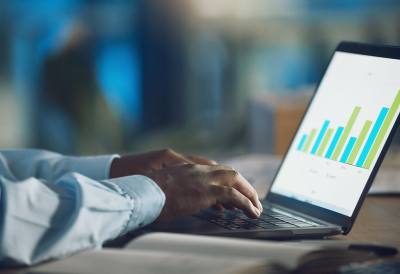 close-up-of-adult-checking_growth_in_website_traffic