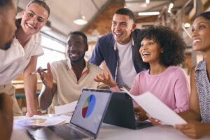 Multi_Cultural_Business_Team_Measuring_Performance_and_Maximising_Return_on_Investment